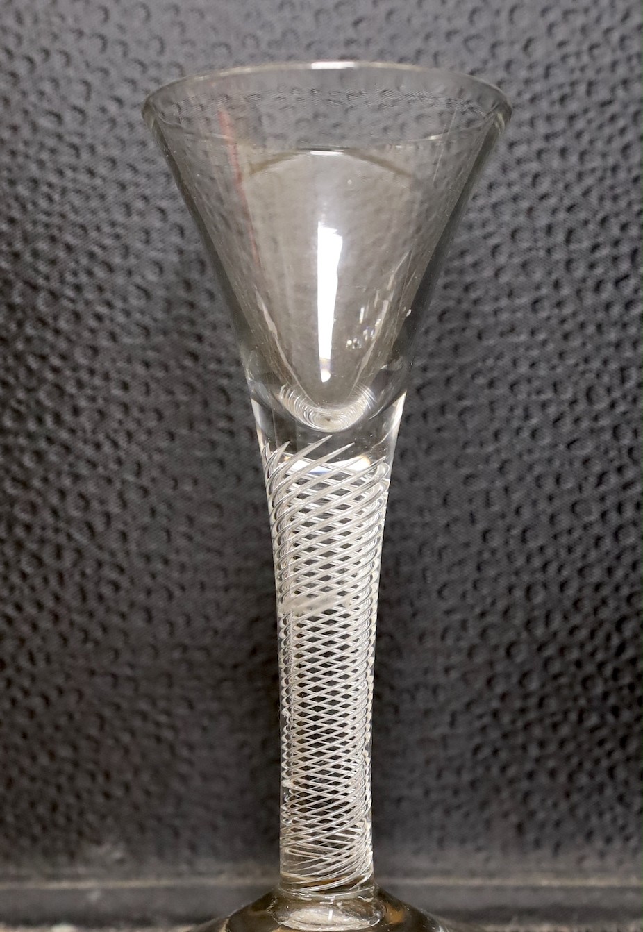 Two 18th century drawn trumpet wine glasses, one with air twist stem, tallest 15.5cm